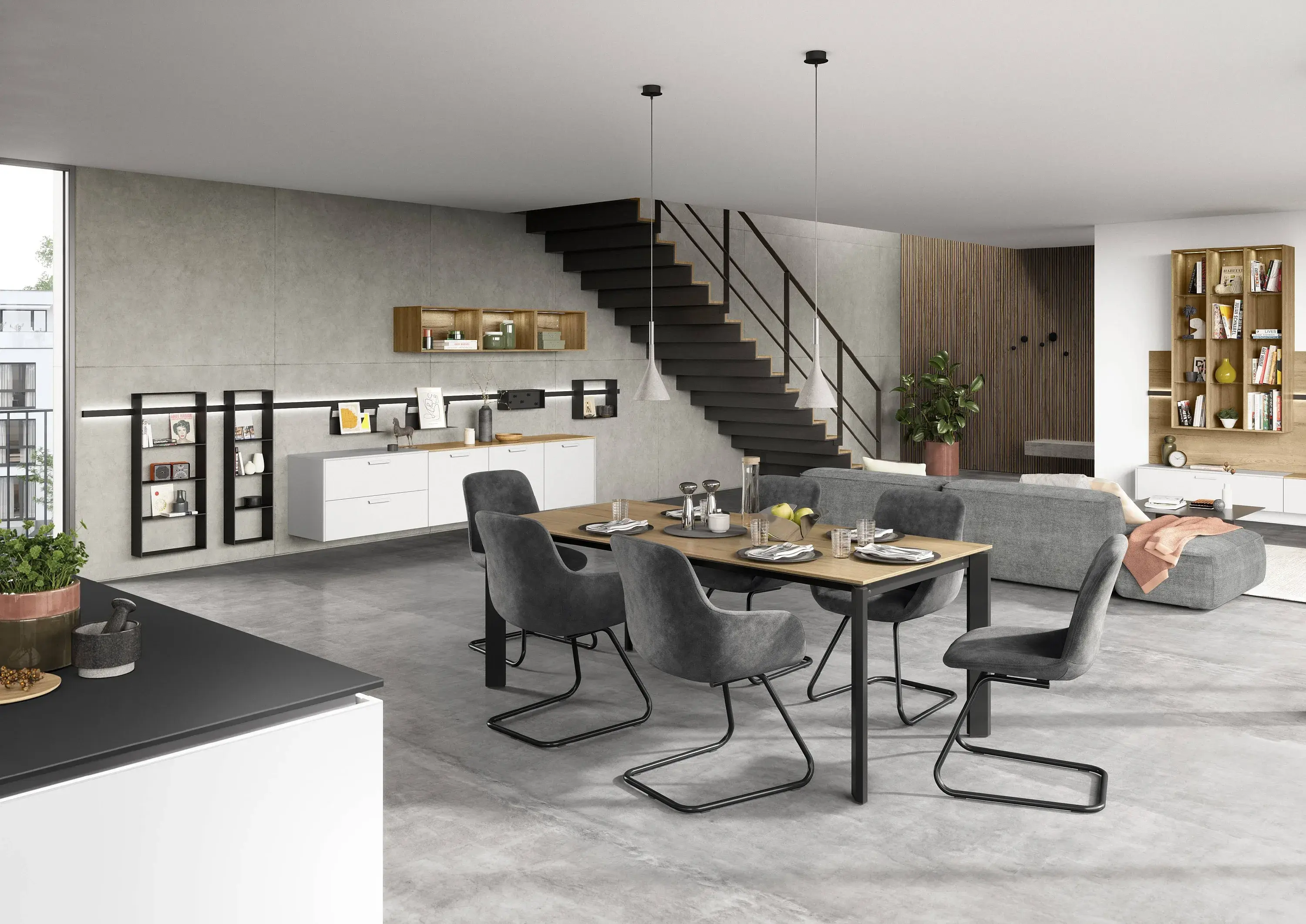 Essplatz in einer Wohnküche mit 6 grauen Polsterstühlen an einem Esstisch mit Holzplatte und schwarzen Metallbeinen Nobilia Artis